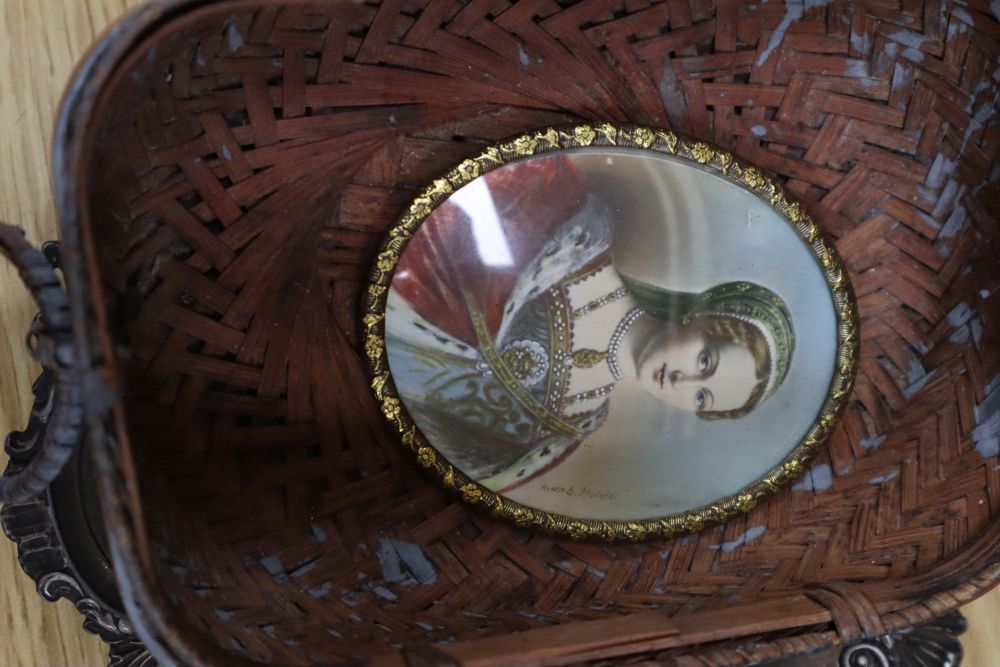 Assorted decorative objects including metalware, books, etc.
